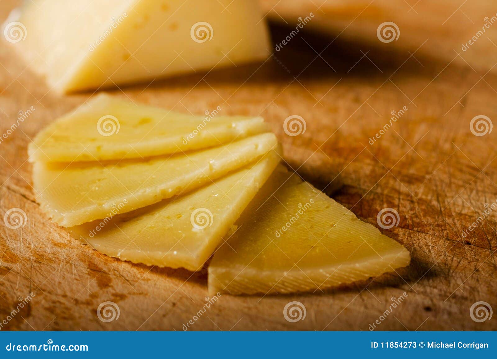 four slices of spanish manchego cheese