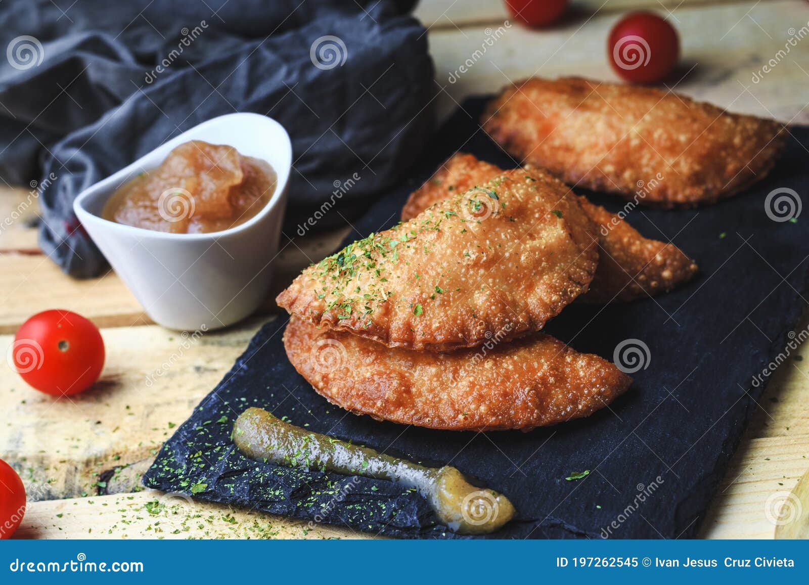 Four Small Pasty Homemade with Applesauce on Slate Plate. Stock Image ...