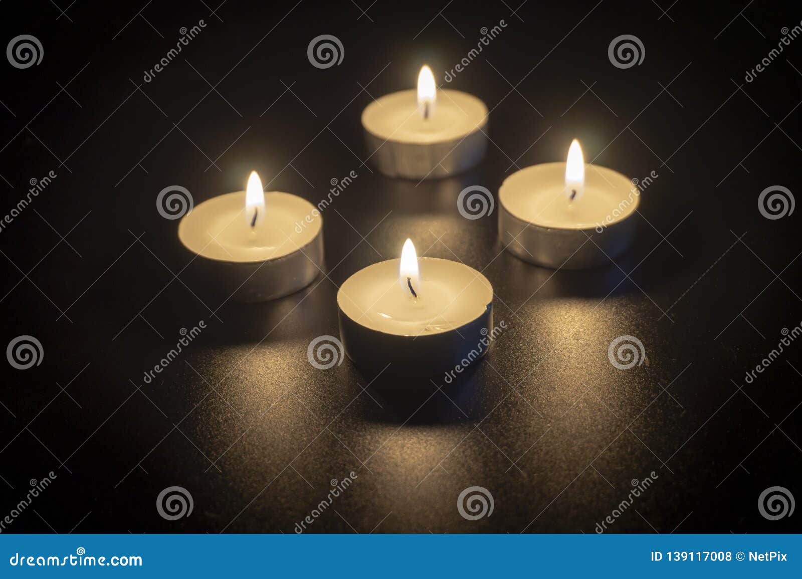 Four Tea Candles with Reflection on Black Stock Photo Image of burn