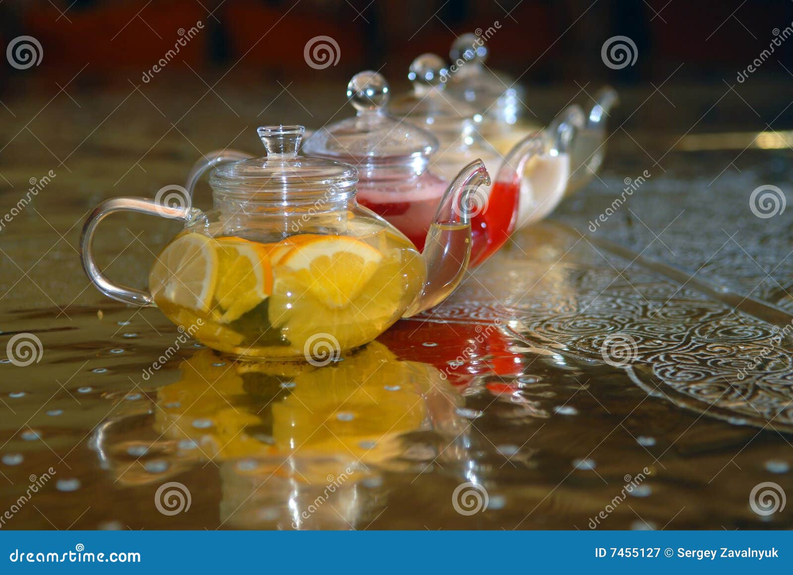 Four teapots with tea stock image. Image of teapots, copper 7455127