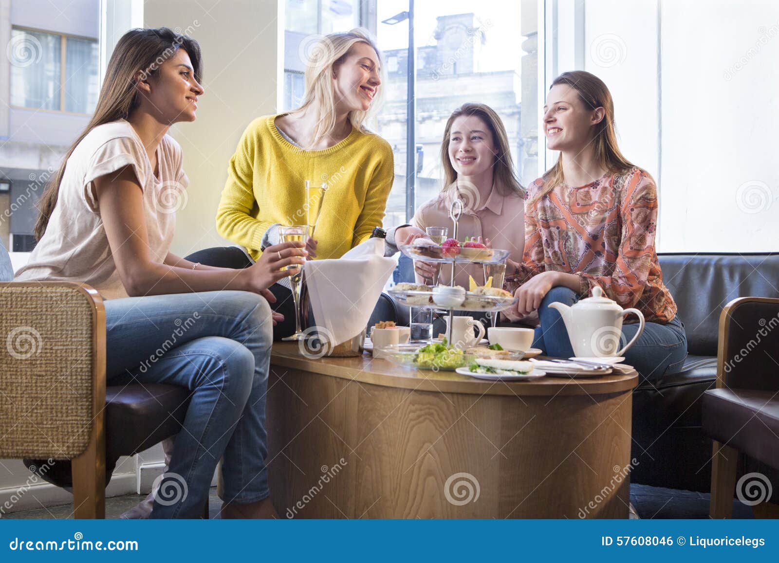 four women having afternoon tea