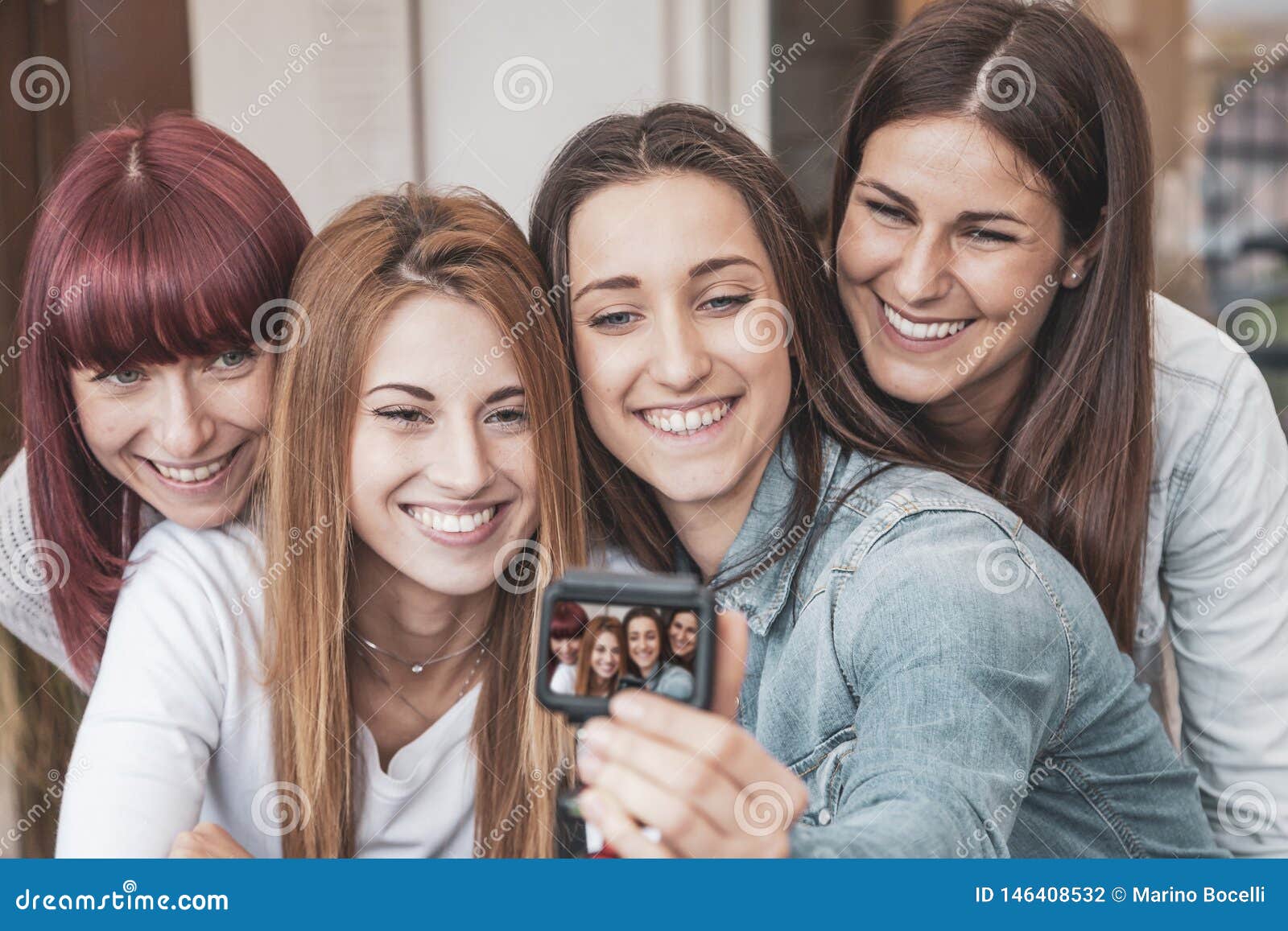Four Young Vloggers Take a Selfie with a Camera Stock Photo - Image of ...
