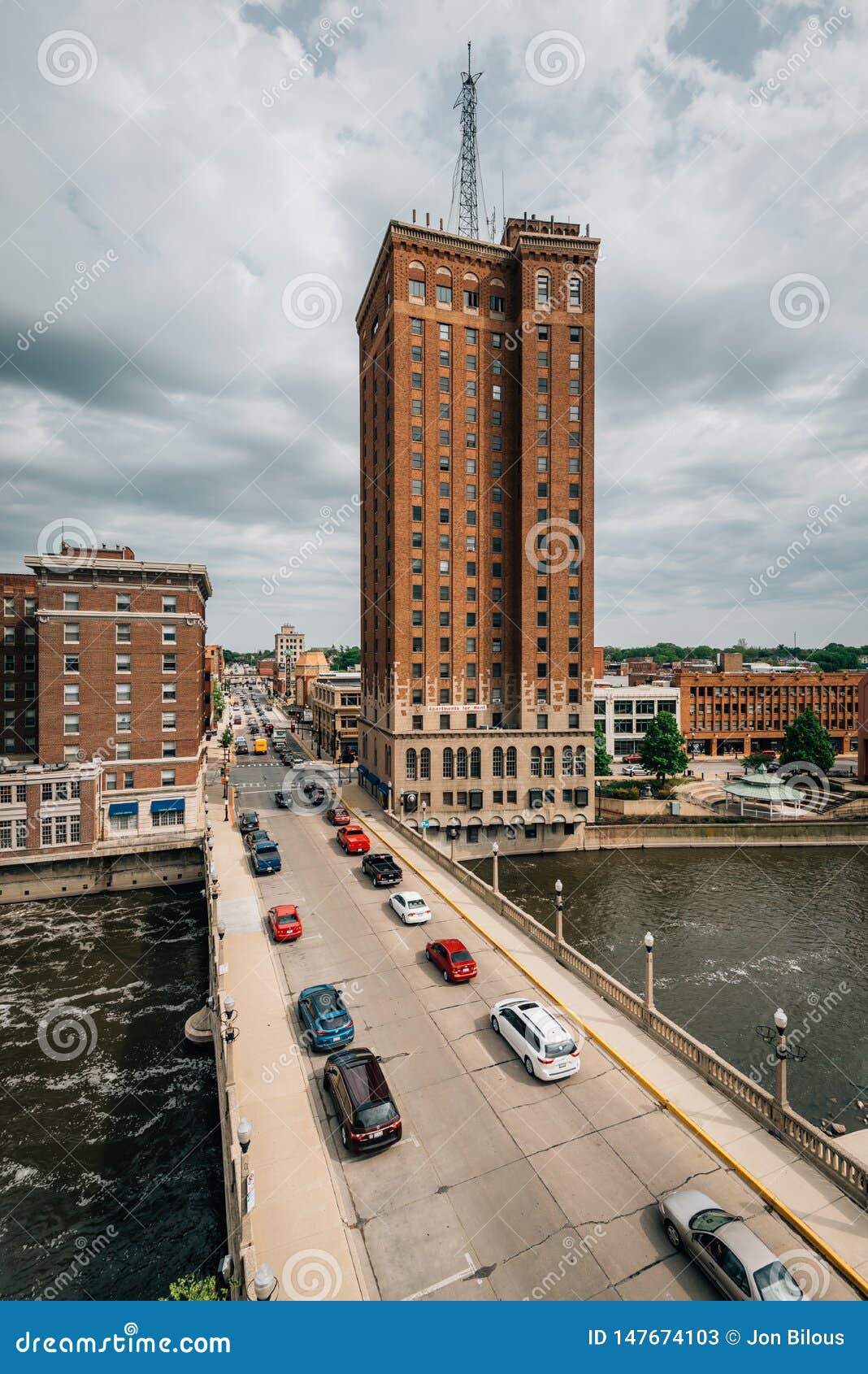 The Fox River and Buildings in Downtown Aurora, Illinois Editorial