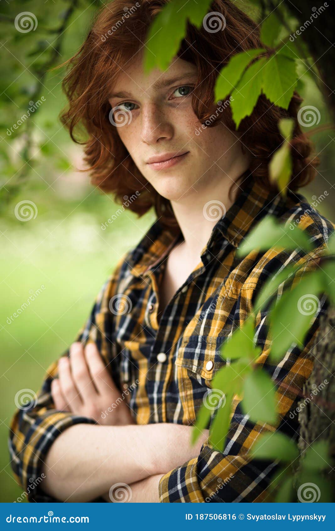 Foxy Freckled Guy Looks at Camera Standing Crossed Hands. Red-haired Young Man with Long Hair Wearing in a Plaid Shirt Stock Photo - Image of masculine, male: 187506816 Foxy Freckled Guy Looks at Camera Standing Crossed Hands. Red-haired Young Man with Long Hair Wearing in a Plaid Shirt Stock Photo - Image of masculine, male: 187506816