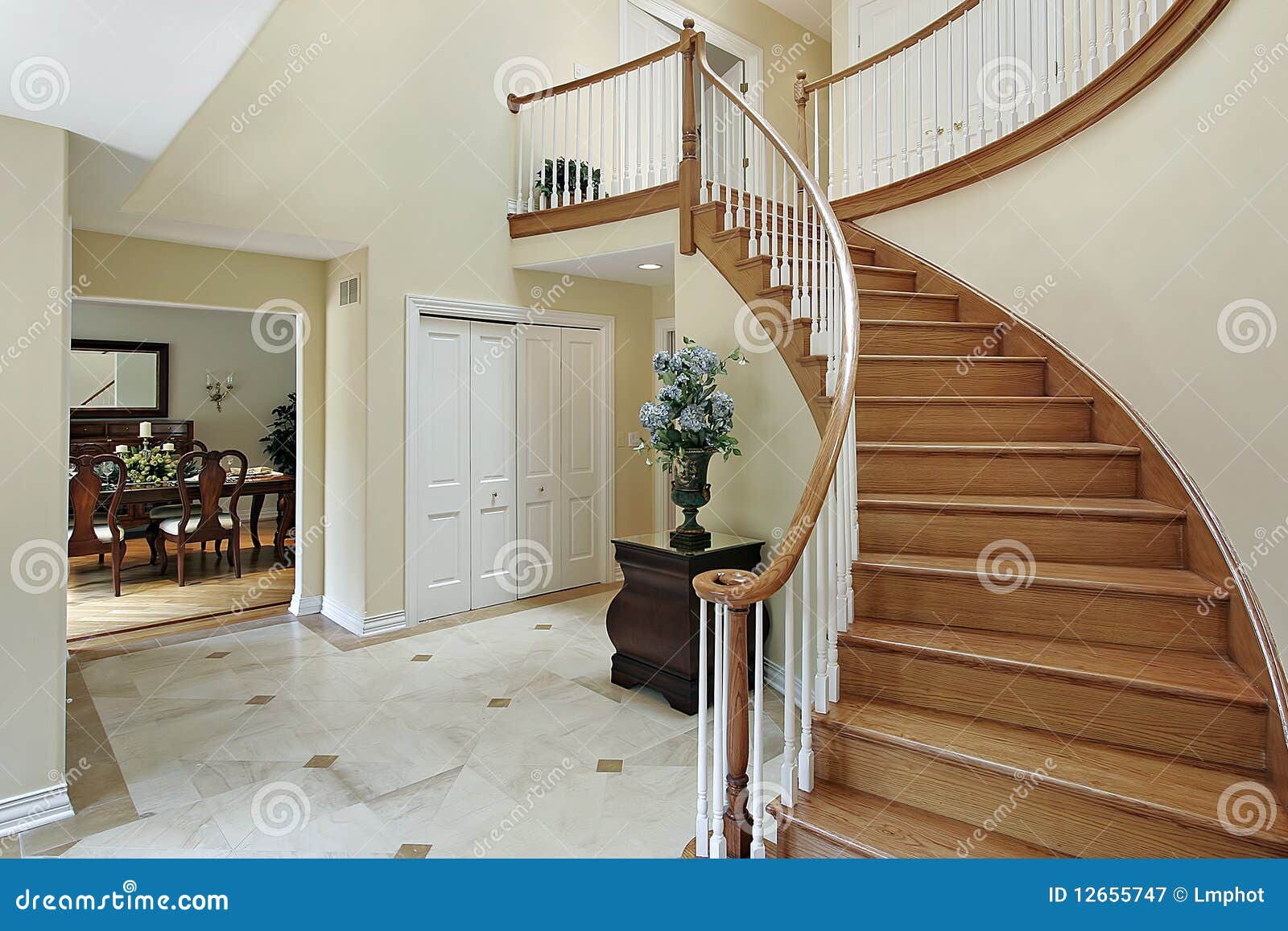 Foyer with Curved Staircase Stock Image Image of chair, staircase