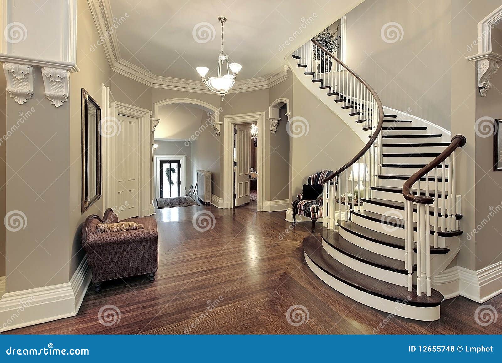 foyer with curved staircase
