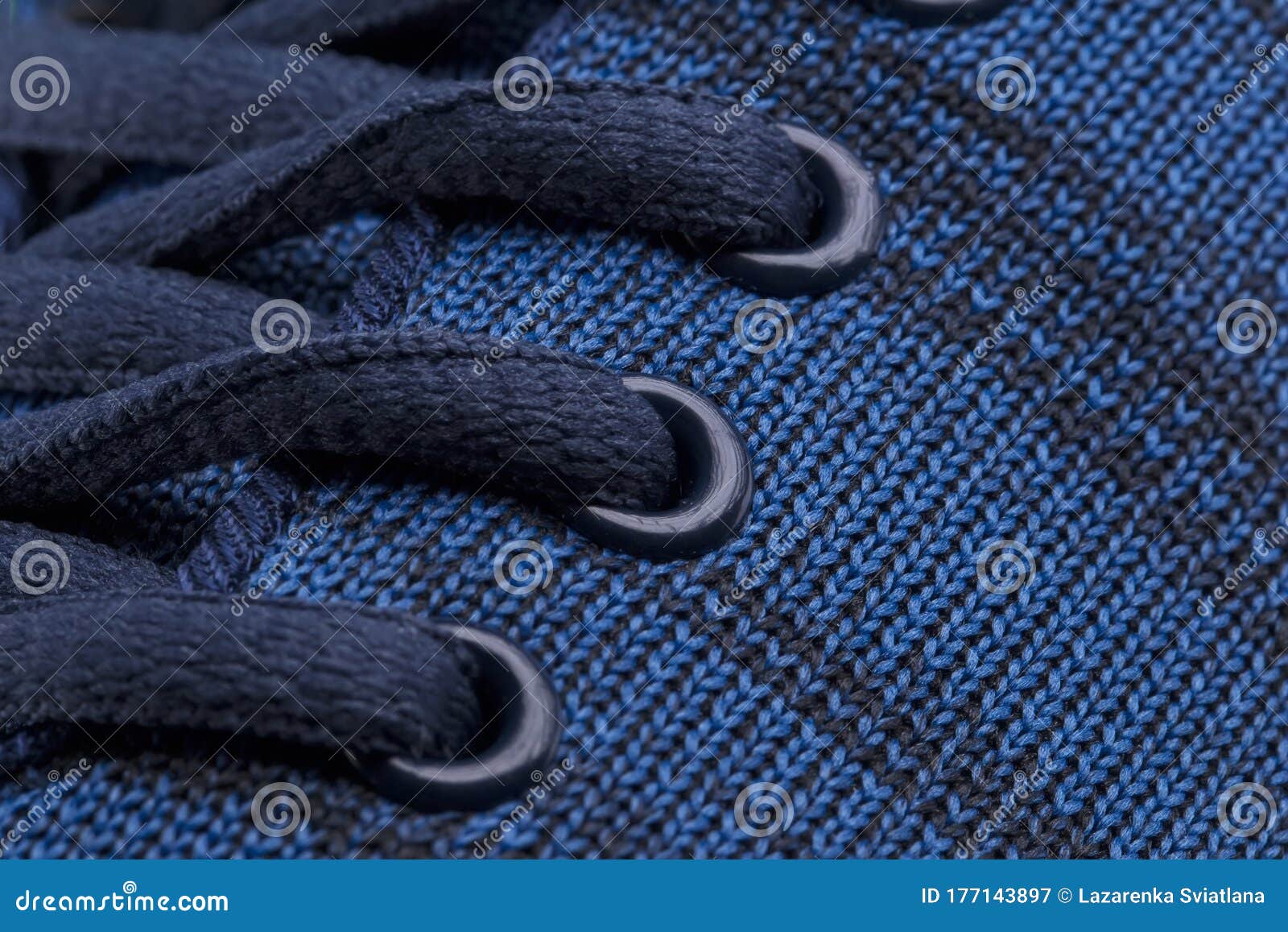 a fragment of a blue sneaker