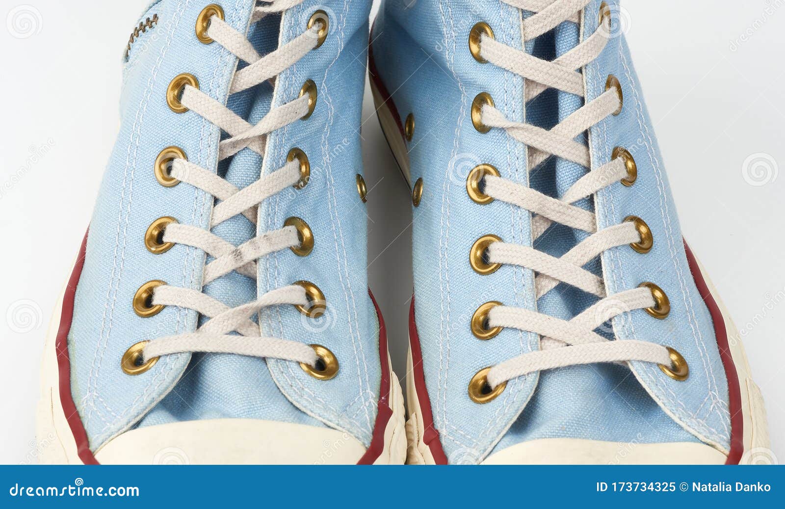 Fragment of a Blue Sneaker with White Textile Laces Stock Image - Image ...