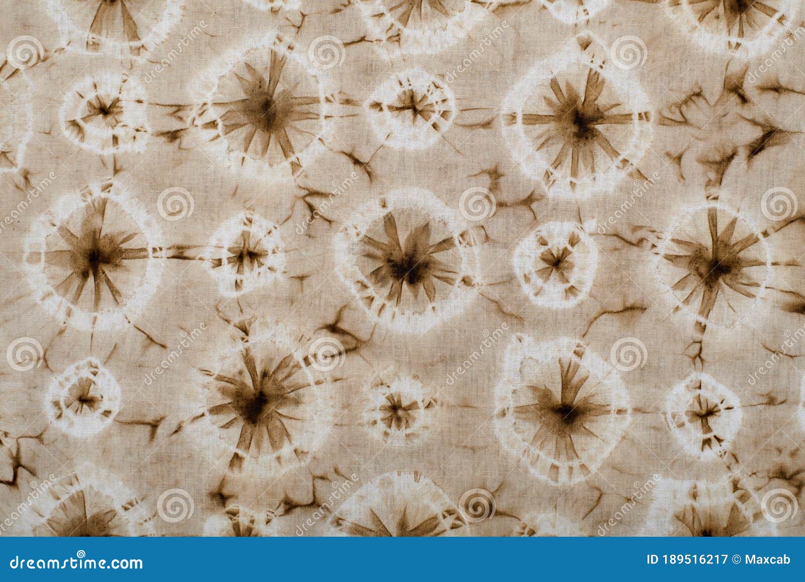 fragment of hand-dyed fabric strip using shibori dyeing technique