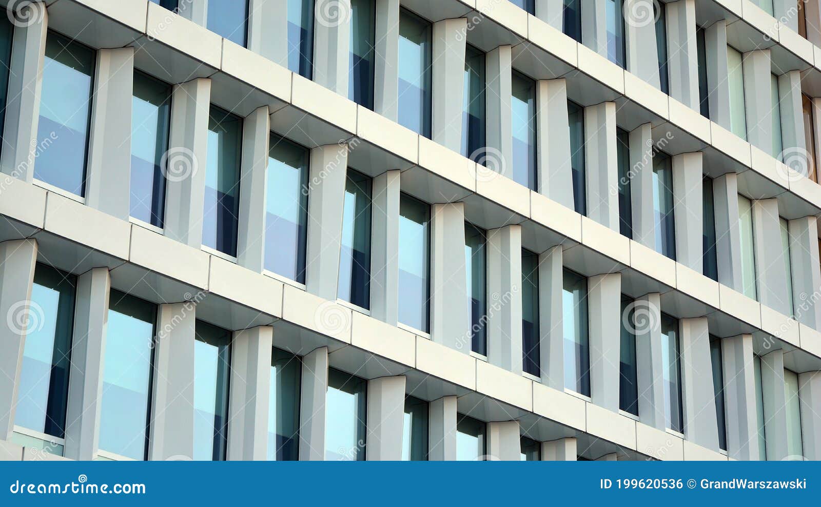 Blue Curtain Wall Made of Toned Glass and Steel Constructions Under ...