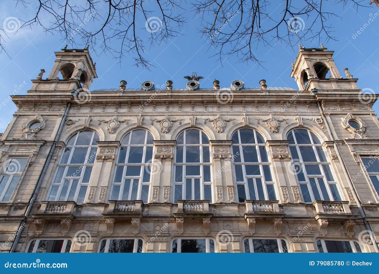 fragment of old building facade with rich decoration in ruse, bulgaria. the opera is historical baroque building, built in 1902