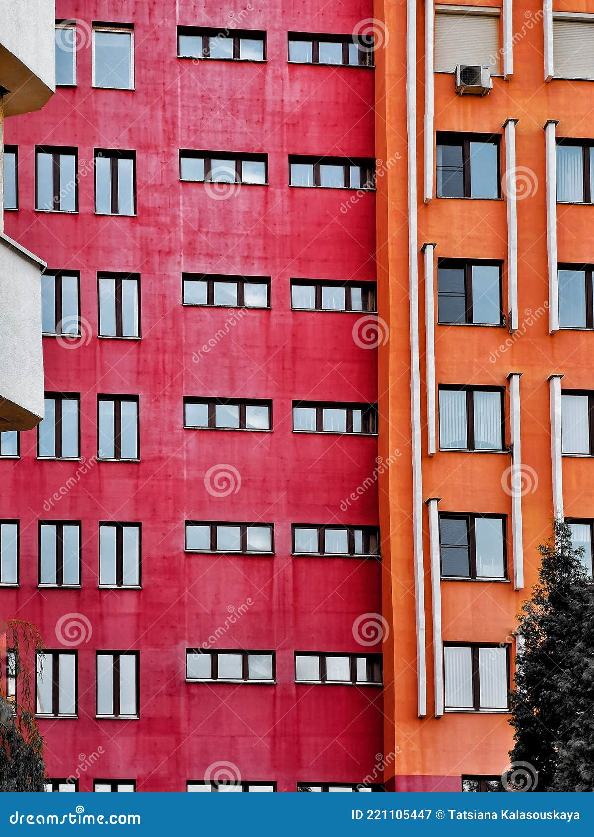 Fragments of Modern Urban Architecture. the Red and Orange Walls of Highrise Buildings Stock