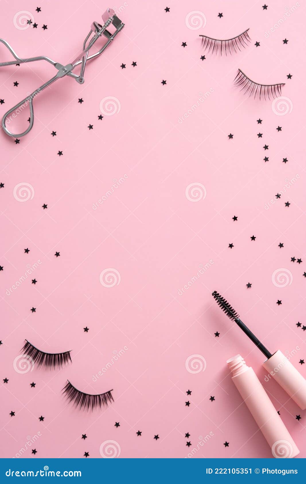 Frame of Mascara, False Eyelashes, Curler and Confetti on Pink ...