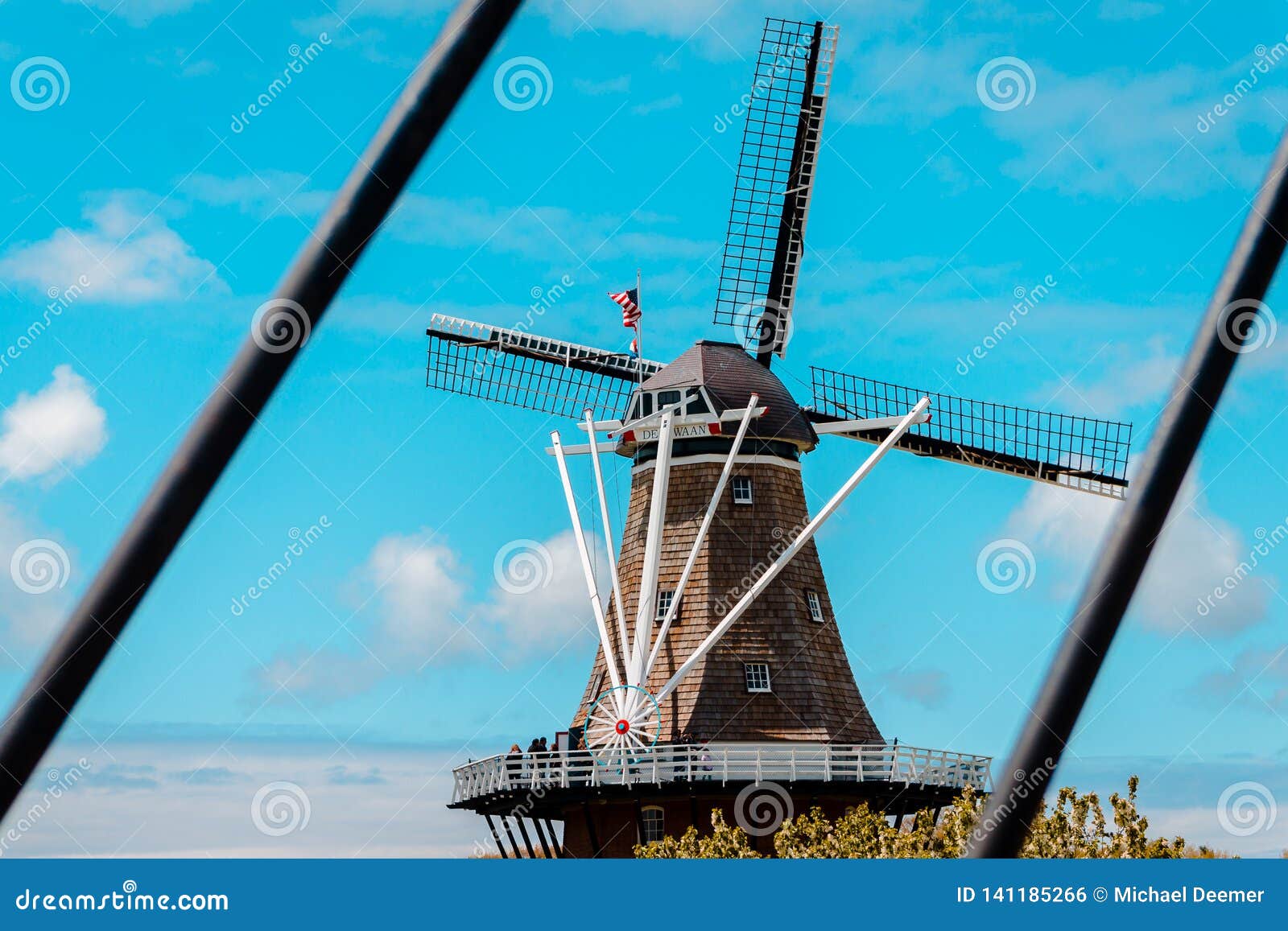 Framed Shot of De Zwaan Windmill in Holland Michigan from the Bridge ...