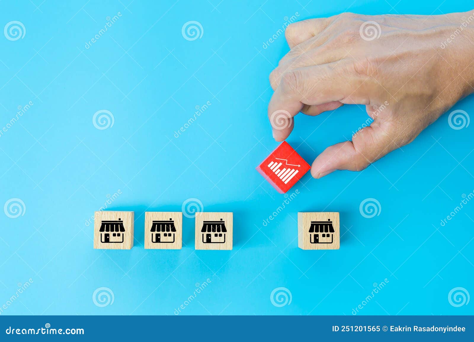 franchise or franchising, hand choose cube wooden toy block stack with graph and franchises business store icon for growth and
