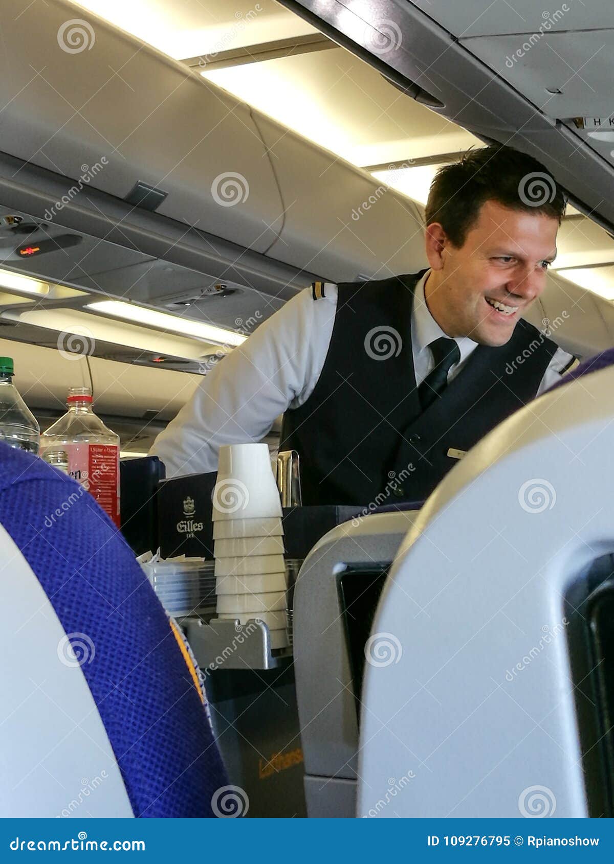 celestial Spider Penelope A Male Flight Attendant Serving in the Economy Class. Editorial Image - Image of drinks, passenger: 109276795 celestial Spider Penelope A Male Flight Attendant Serving in the Economy Class. Editorial Image - Image of drinks, passenger: 109276795