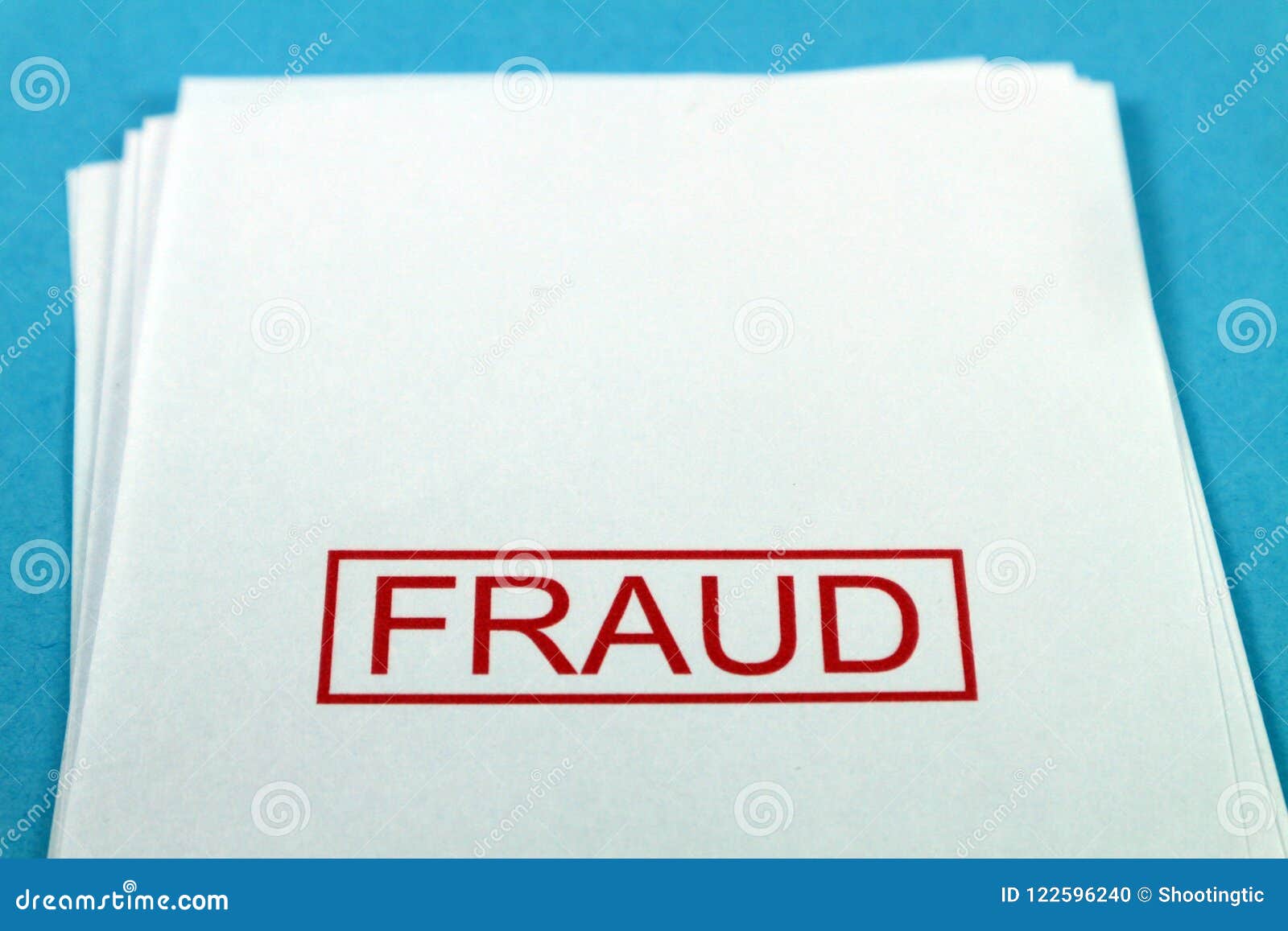 Fraud Word On A Paper On A Blue Desk Stock Photo Image Of Blue