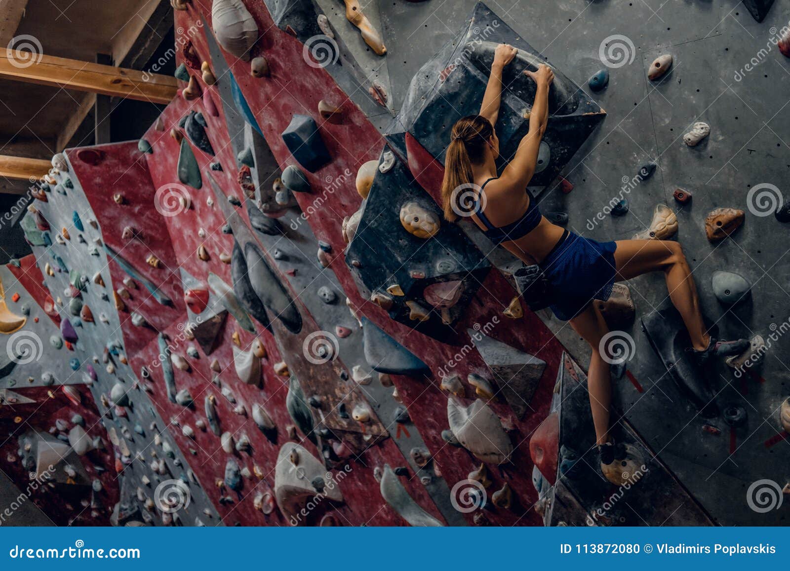 Free Climber Female Bouldering Indoors. Stock Photo Image of extreme