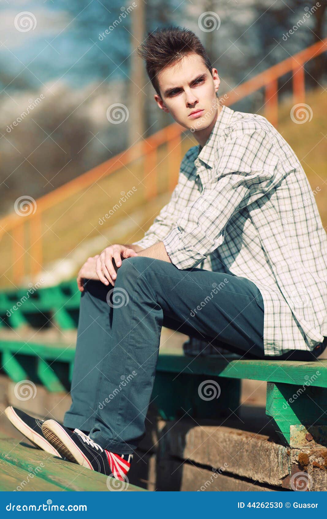 Free Hipster Man Sitting on a Bench in the City Stock Photo - Image of ...