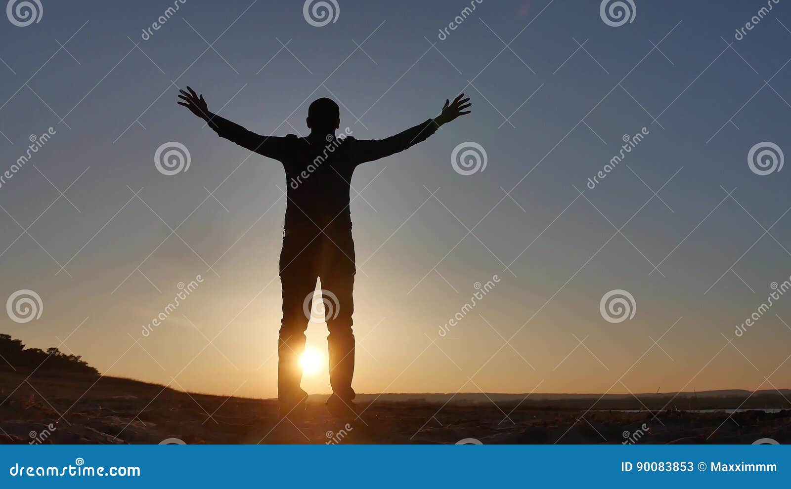 Freedom Man Stands On A Cliff Sunset Silhouette Hand Lifestyle In The