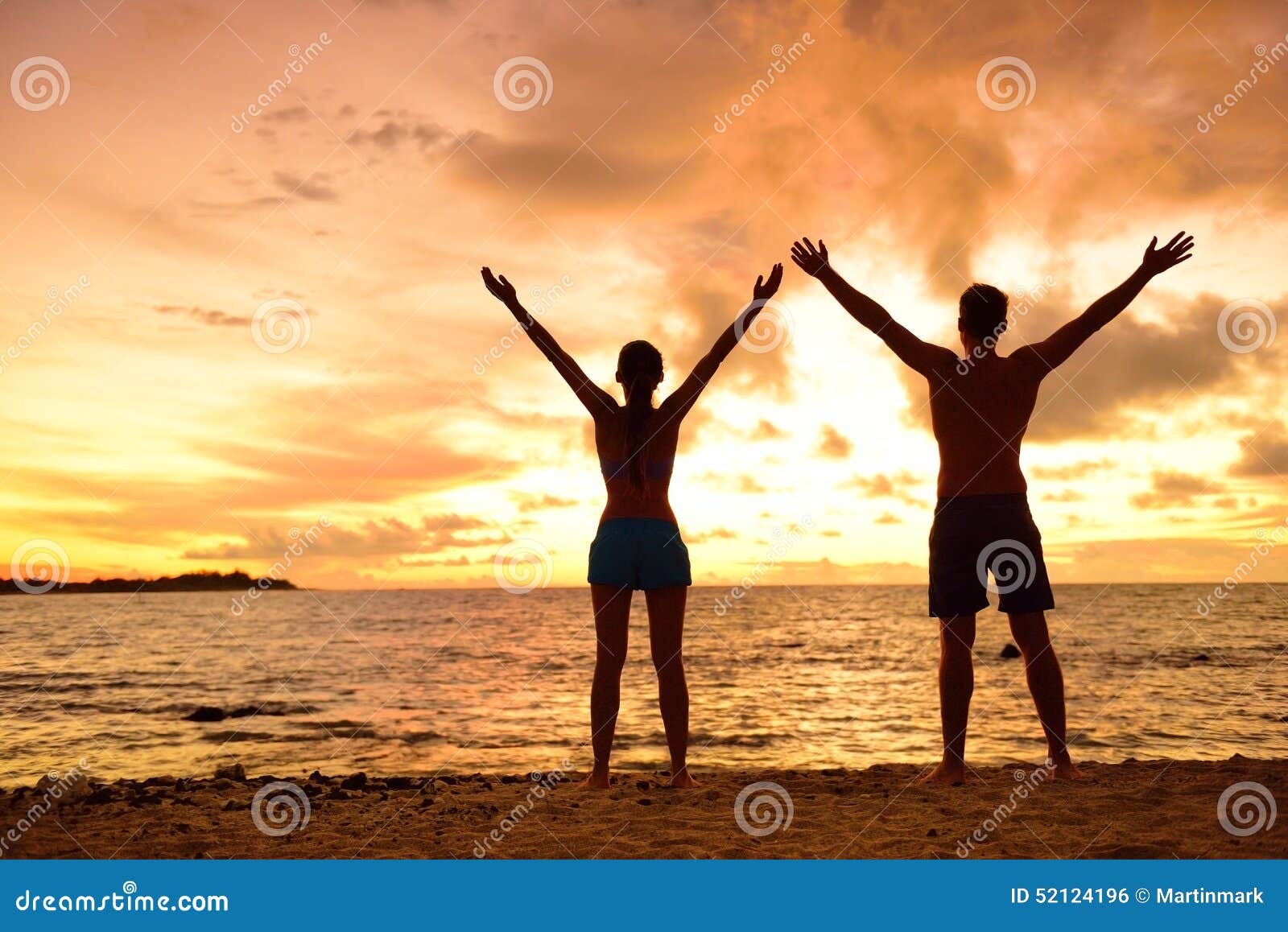 freedom-people-living-free-happy-life-beach-carefree-silhouettes-couple-sunset-arms-raised-up-showing-happiness-52124196.jpg