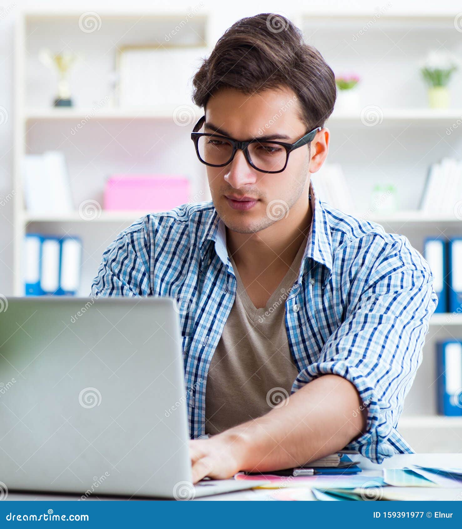 With Project Paperwork Pile In Home Office Stock Photo