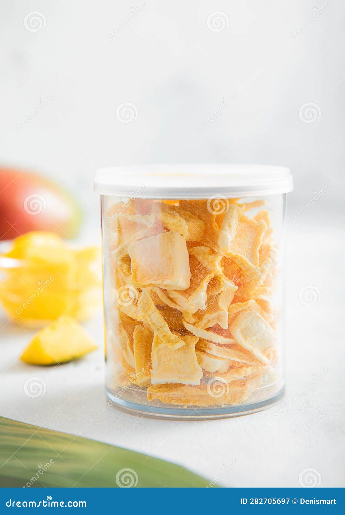 Freeze Dried Mangoes for Cereal in Plastic Jar on Light Background Stock Image Image of