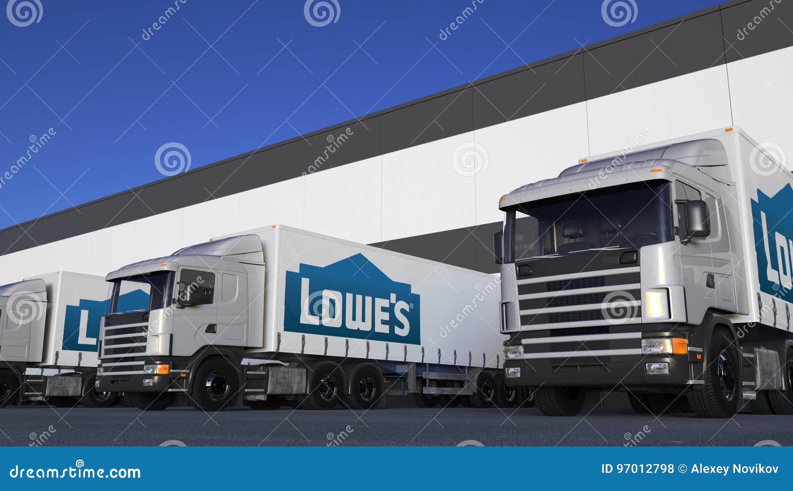 Freight Semi Trucks with Lowe`s Logo Loading or Unloading at Warehouse