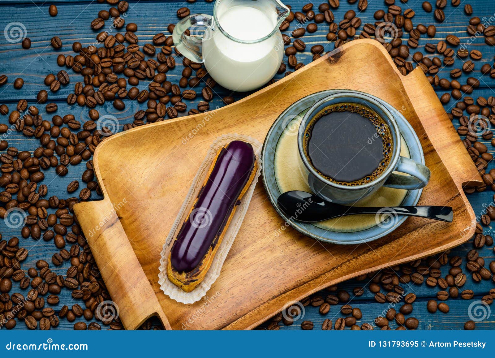 French Coffee with Cream and Eclair and Coffee Beans Stock Image