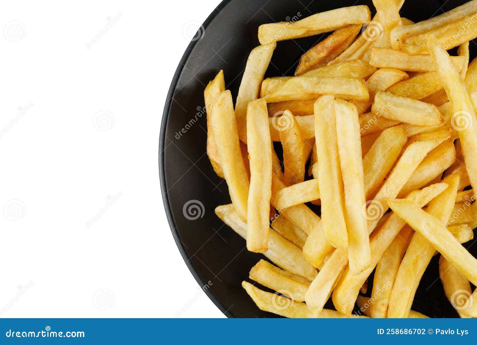 French Fries in a Black Plate Isolate. Appetizing Fried Potatoes Stock