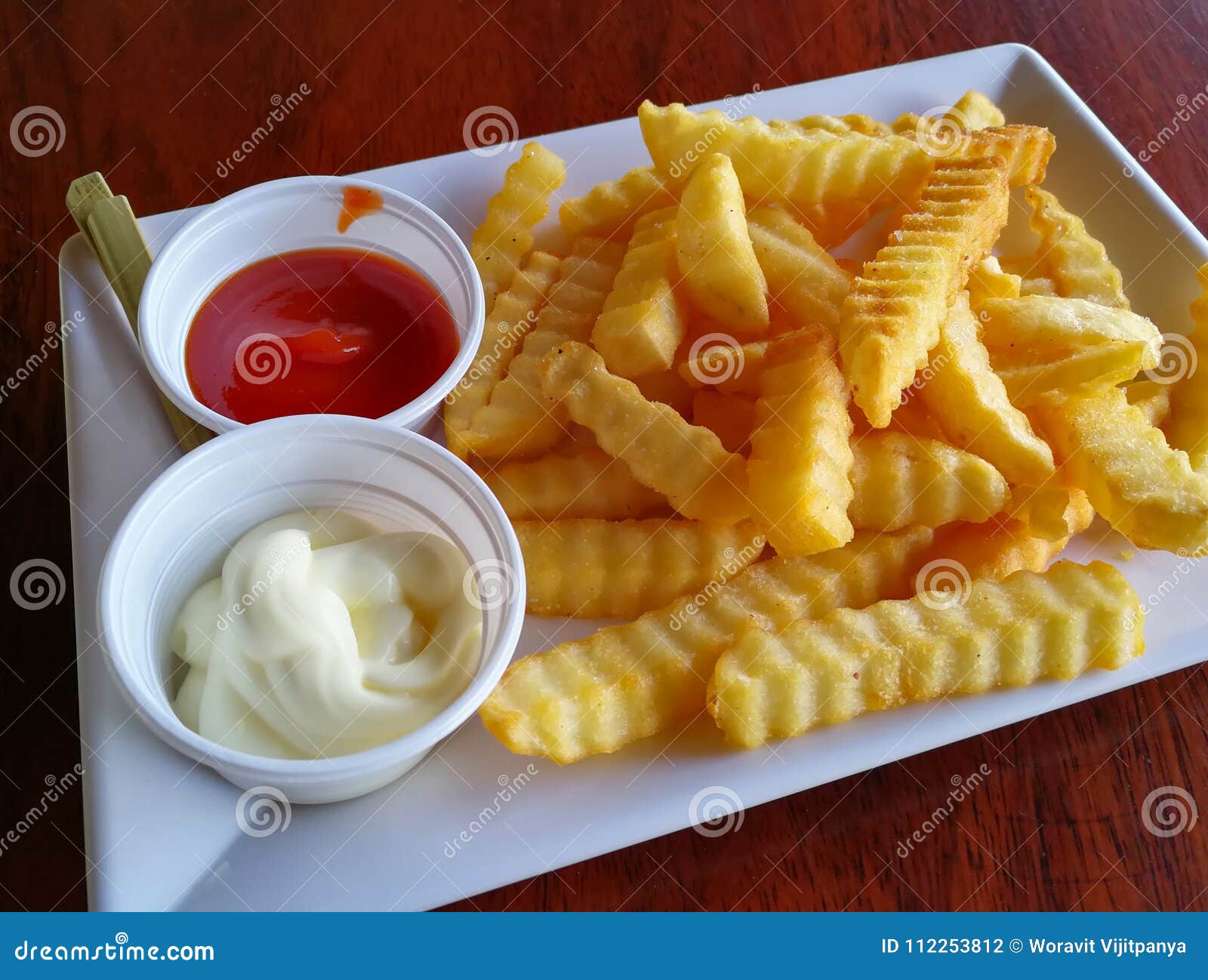 French Fries Dip To Tomato Sauce Stock Photo - Image of fryer, eating ...