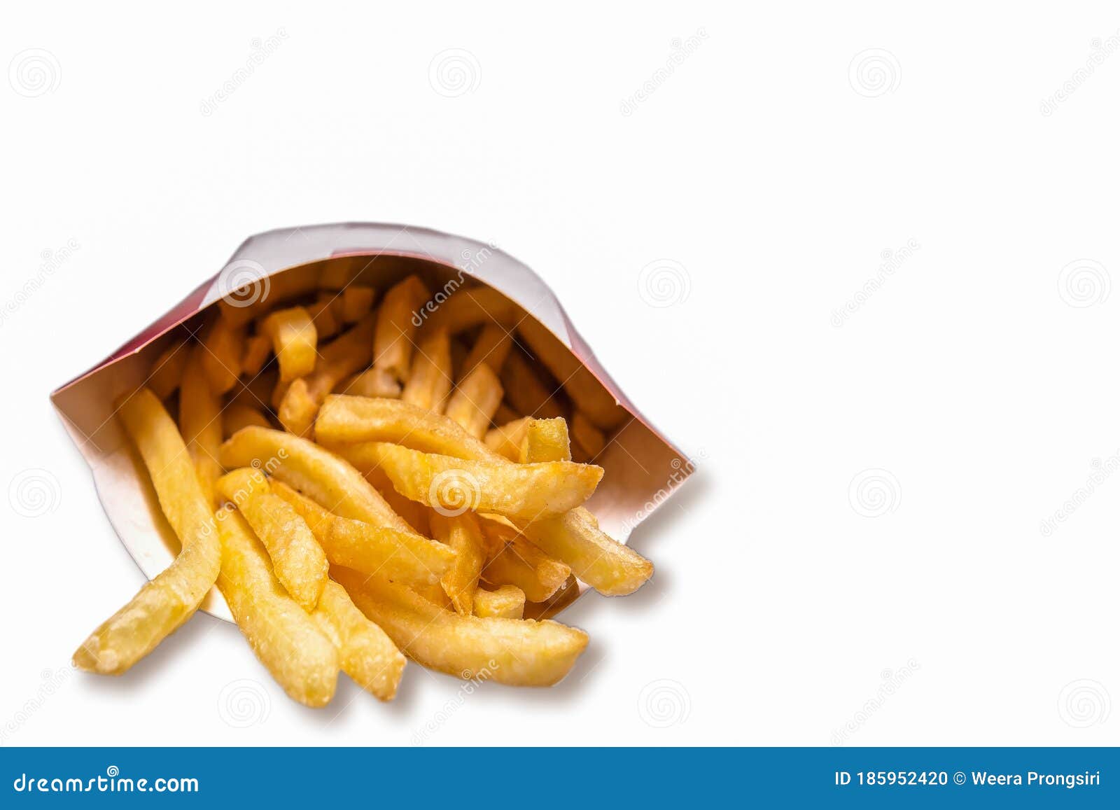 French fries in a brown paper bag isolated on a white background