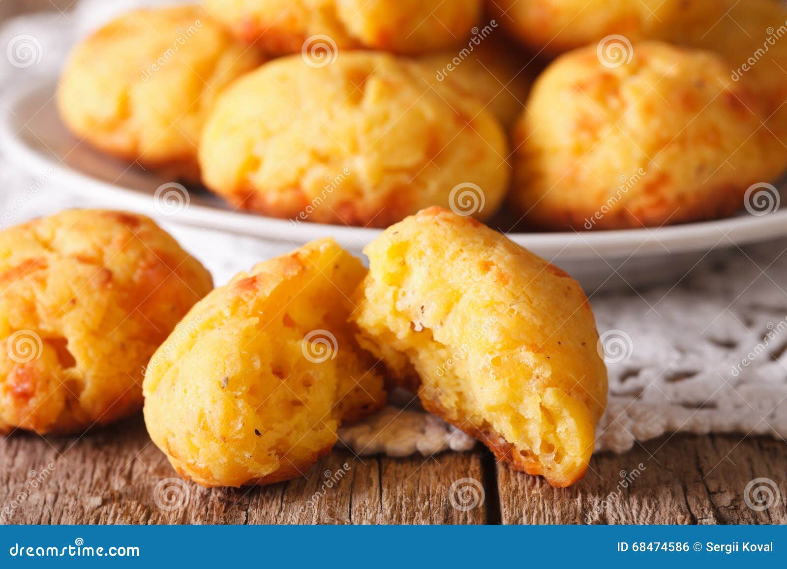 french gougere buns with cheese close-up on the table. horizontal