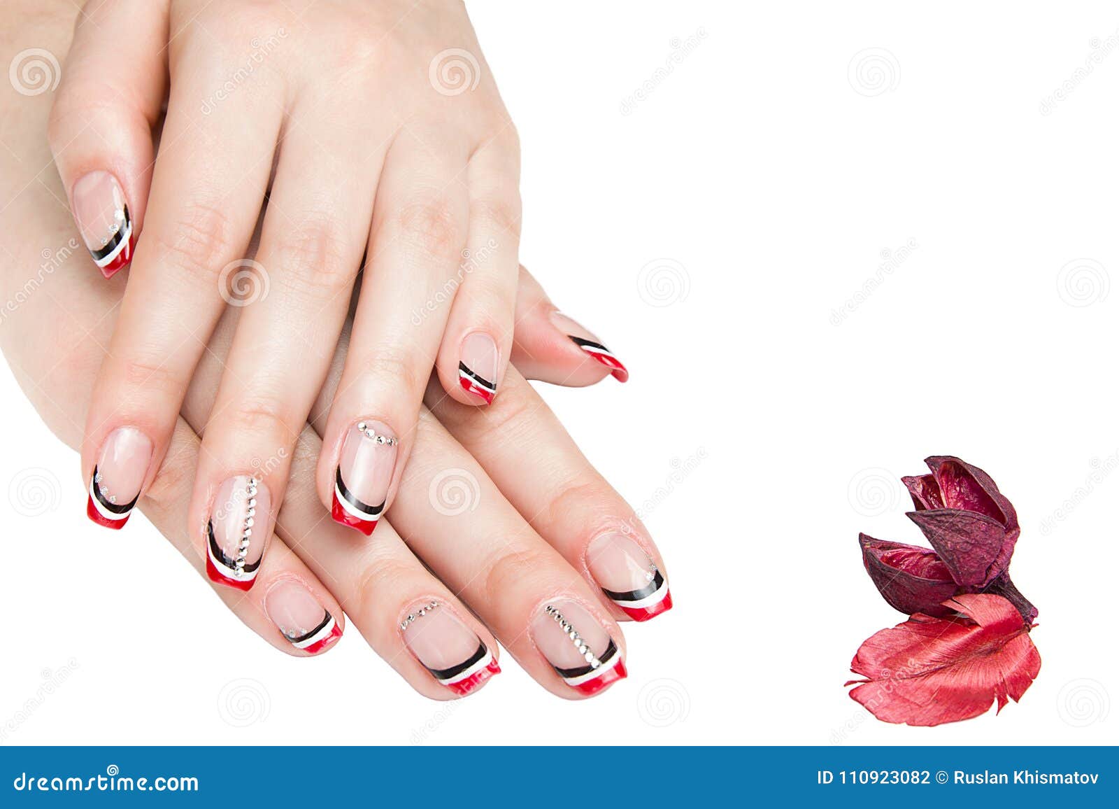 French Manicure - Beautiful Manicured Female Hands with Red Black and White  Manicure with Rhinestones Isolated on White Background Stock Photo - Image  of classy, manicured: 110923082