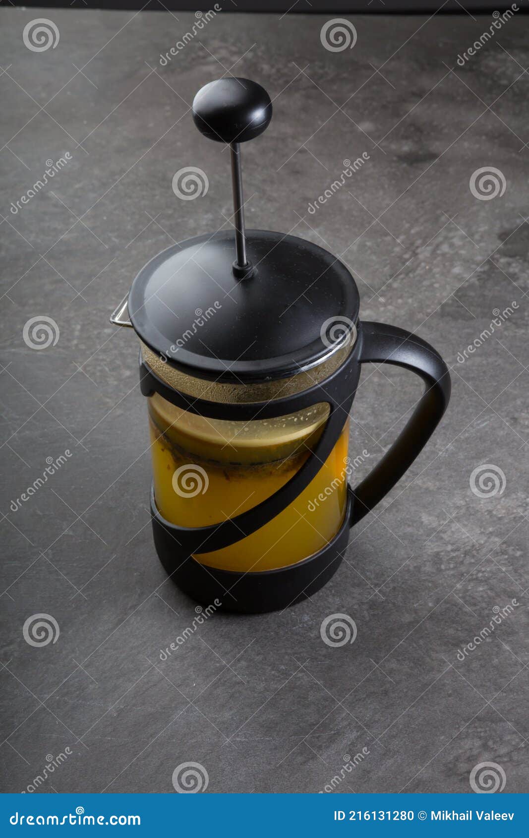 French Press with Yellow Herbal Tea on a Table Stock Photo Image of