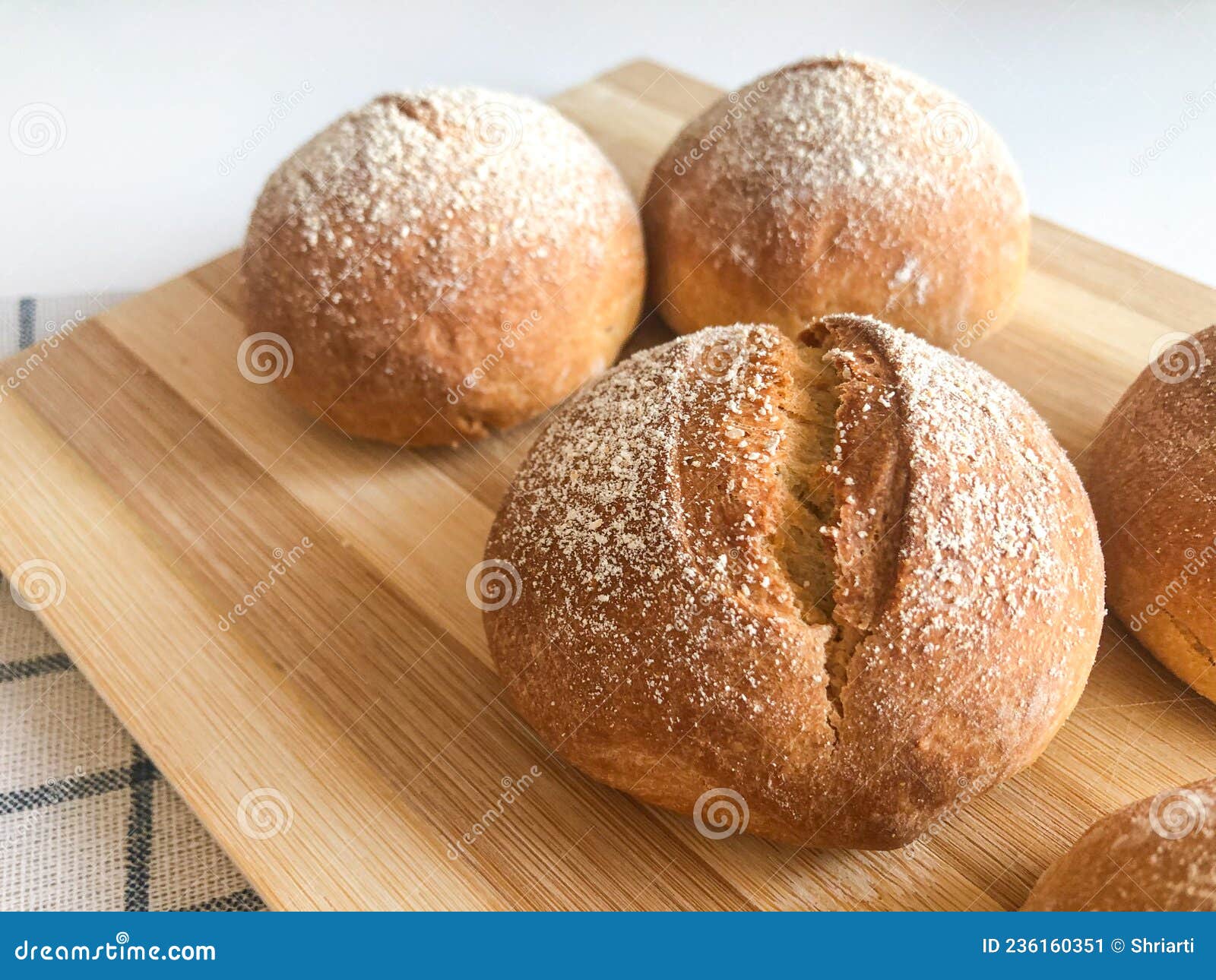 https://thumbs.dreamstime.com/z/french-wheat-buns-petit-pain-served-plate-wooden-cutting-board-close-up-traditional-mini-bun-little-breakfast-236160351.jpg