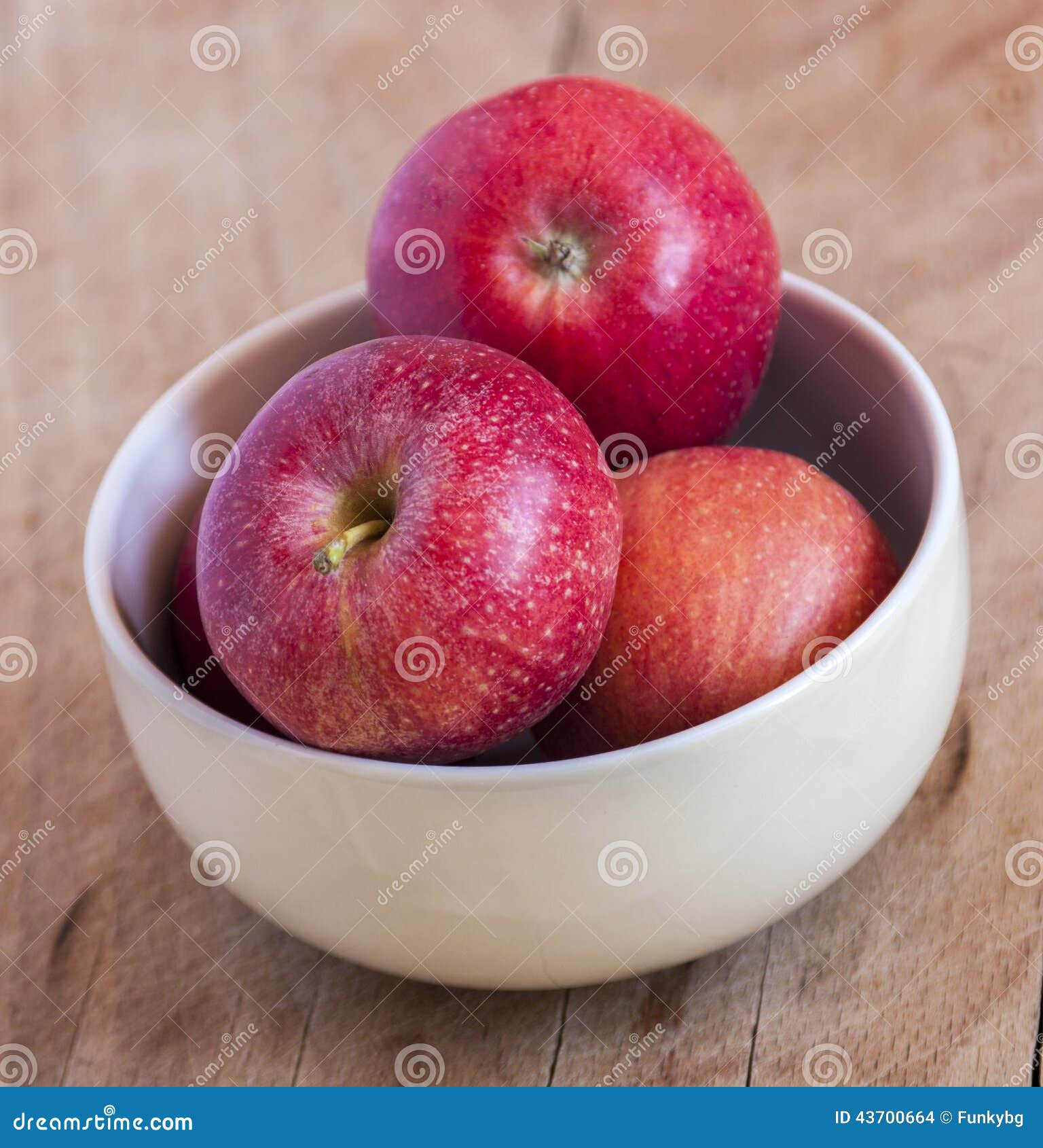 Fresh apples in a bowl stock photo. Image of container 43700664