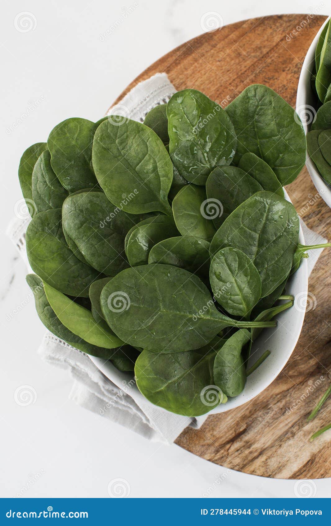 Fresh Baby Raw Spinach on a Plate. Healthy Eating. Stock Photo Image