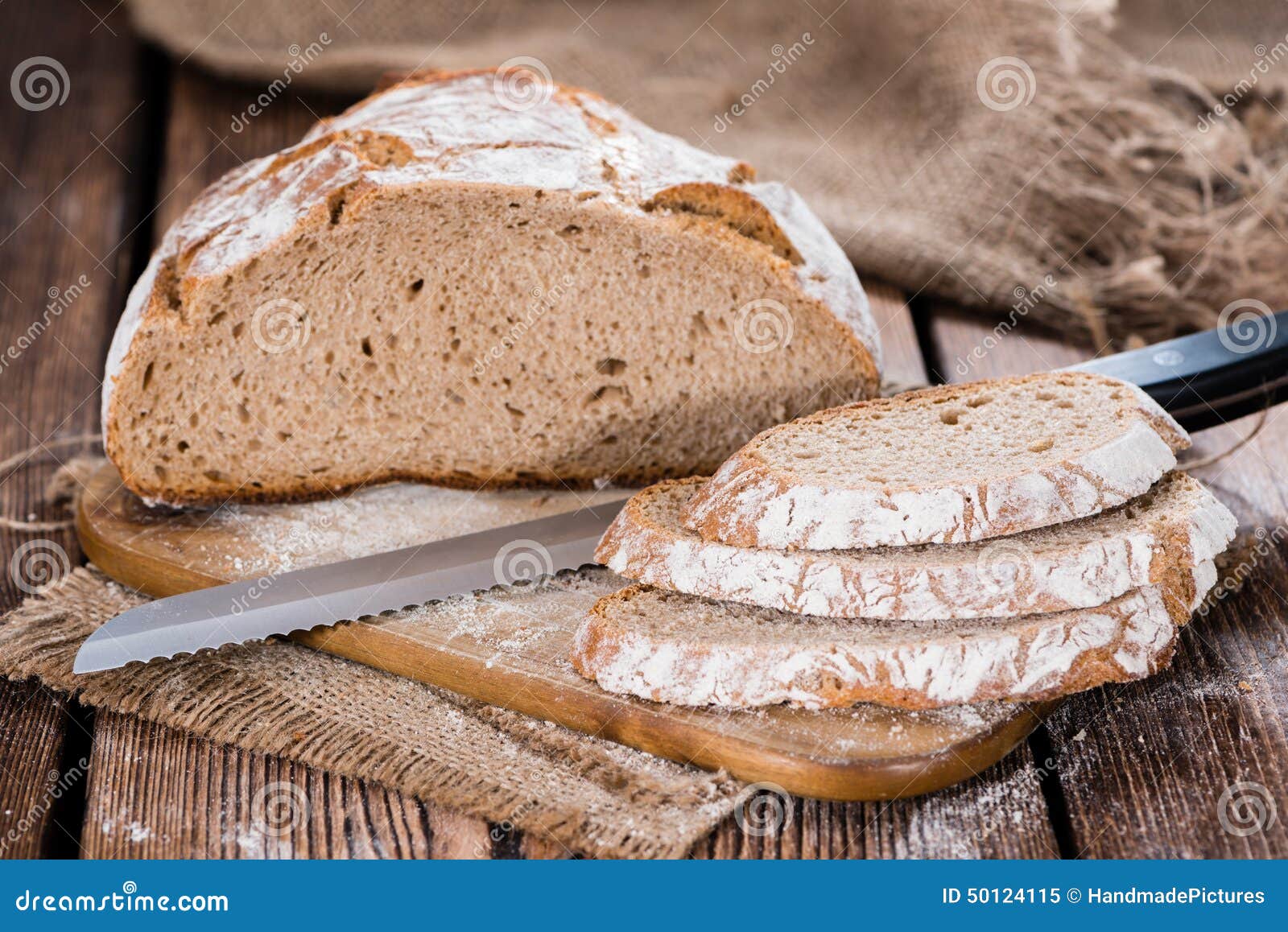 Fresh baked Loaf of Bread stock image. Image of flour 50124115