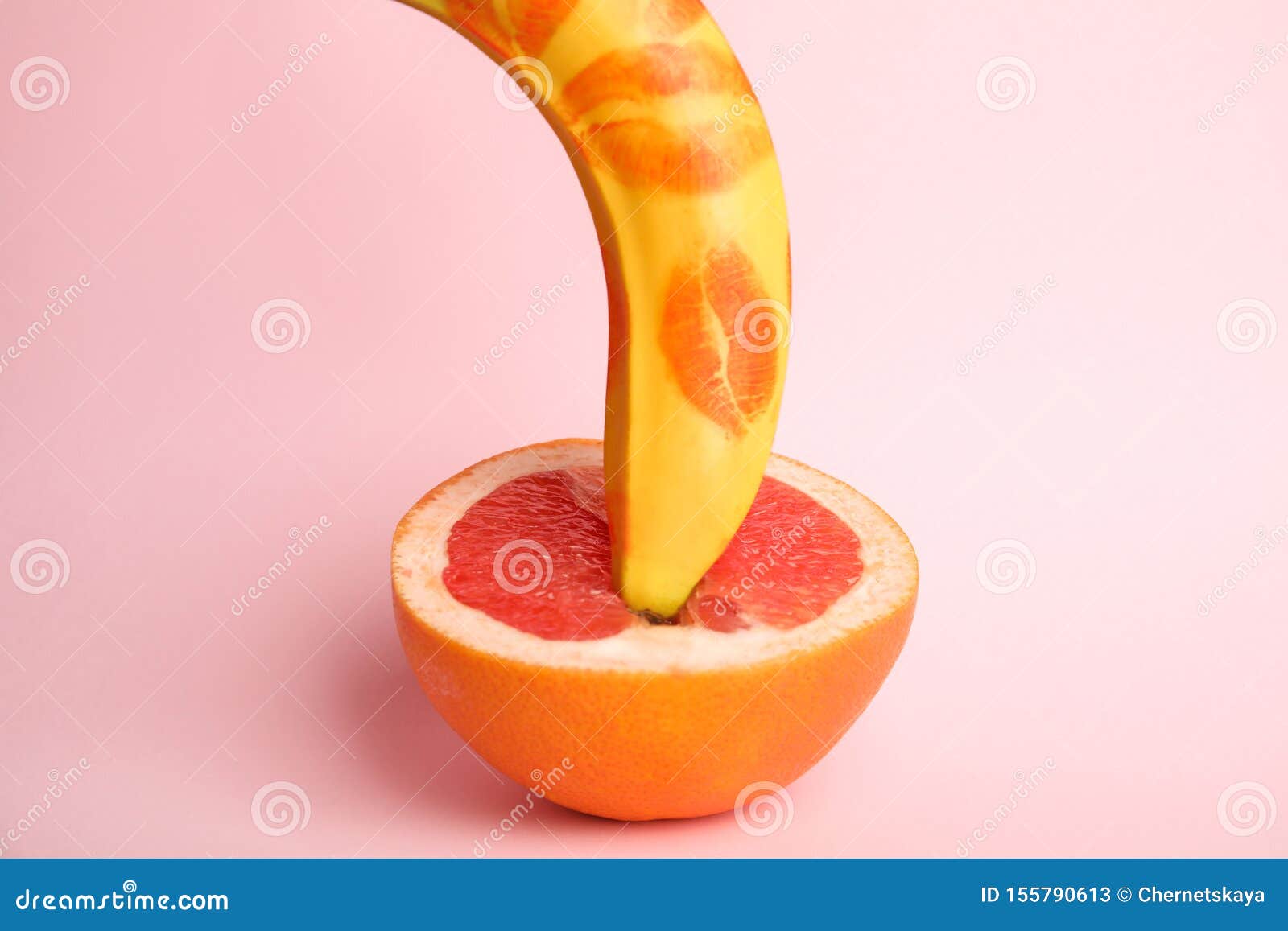 Fresh Banana With Red Lipstick Marks And On Pink Background Sex