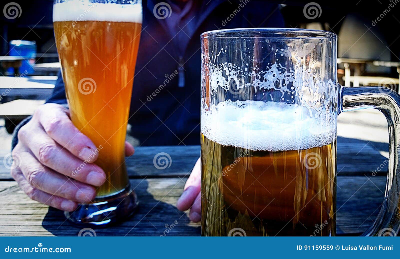 Fresh beer at open air bar stock image. Image of drinking 91159559
