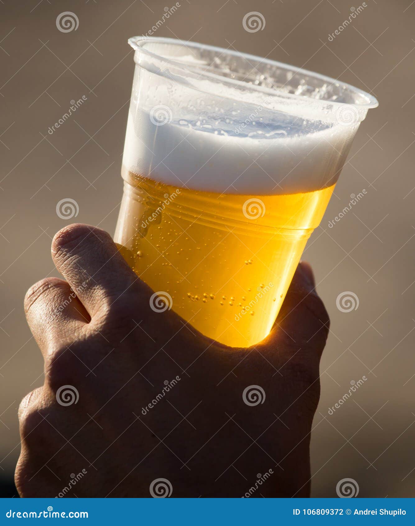 Fresh Beer in a Plastic Cup in the Hand Stock Photo Image of pint