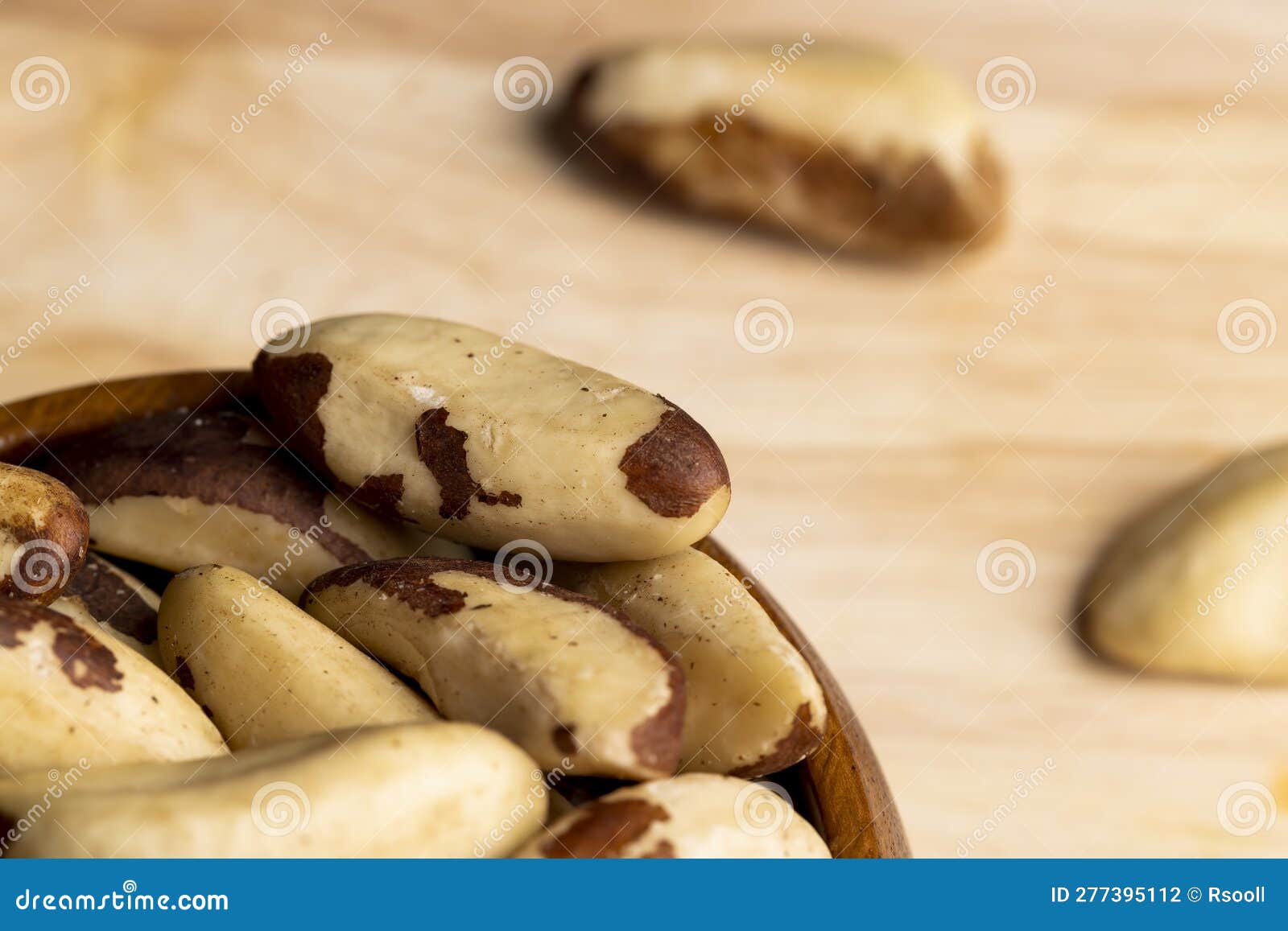 Fresh Brazil Nuts Peeled from the Shell on the Table Stock Photo