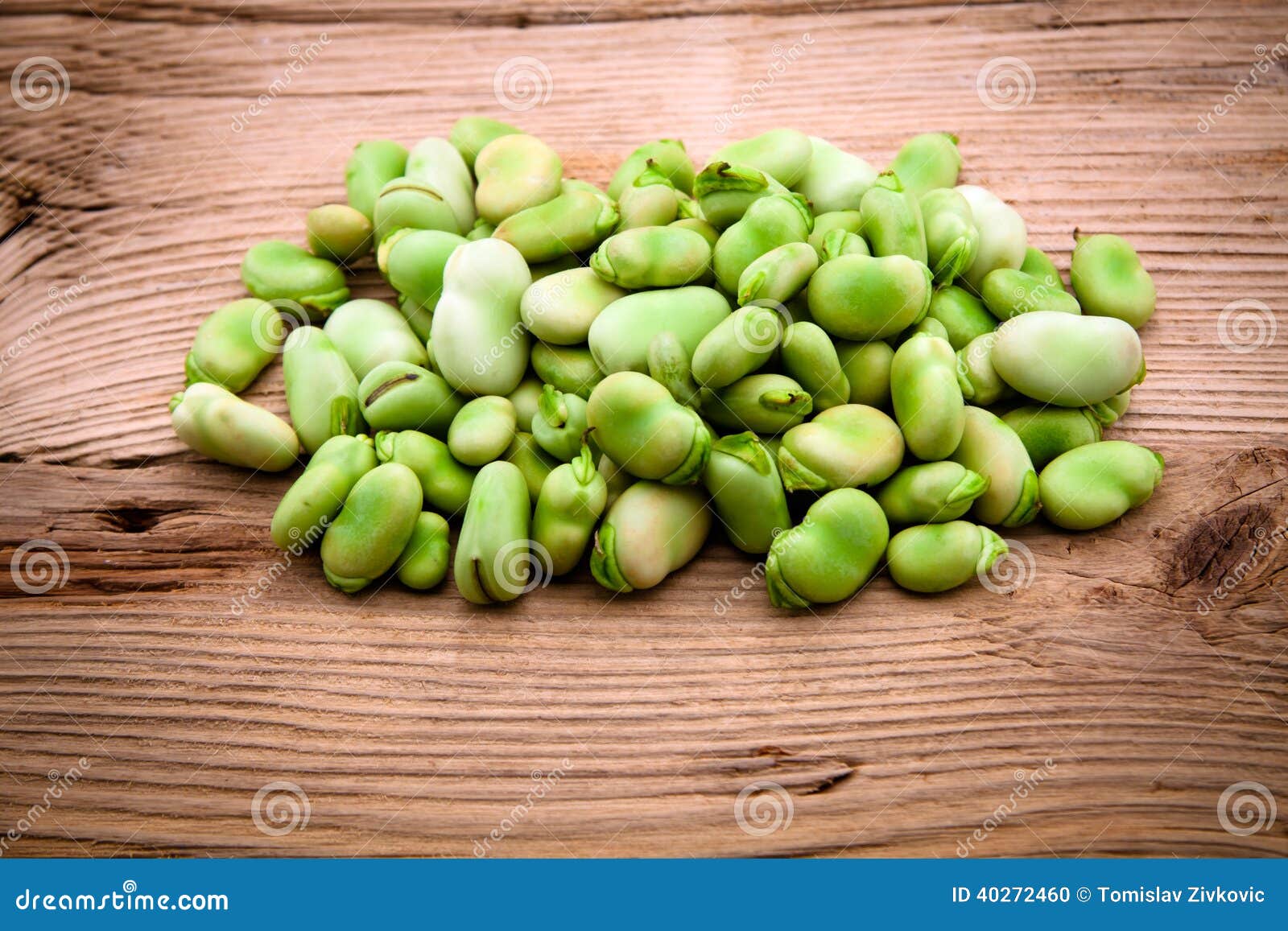 fresh broad bean on old wooden