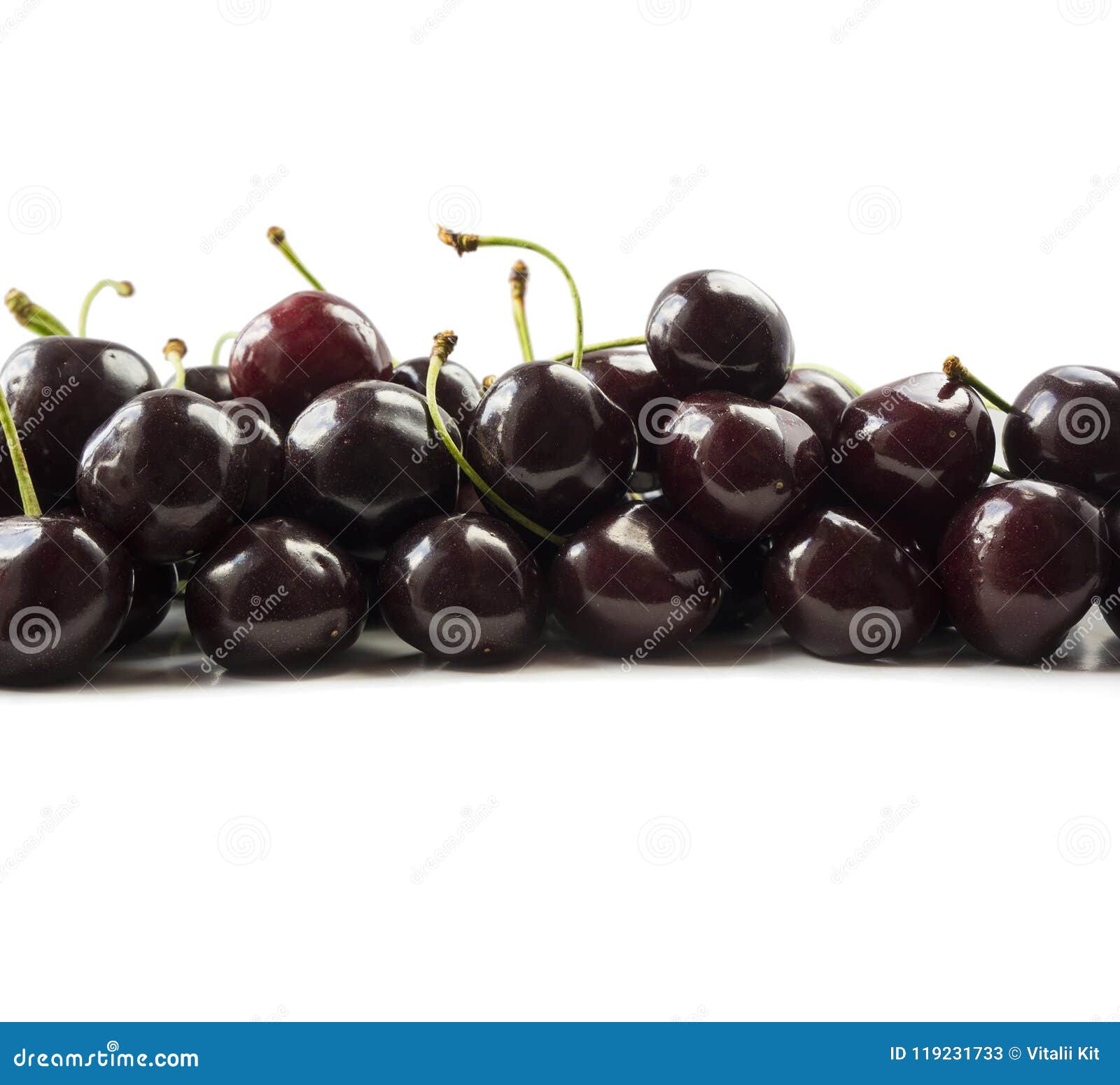 Fresh Cherries At Border Of Image With Copy Space For Text. Background