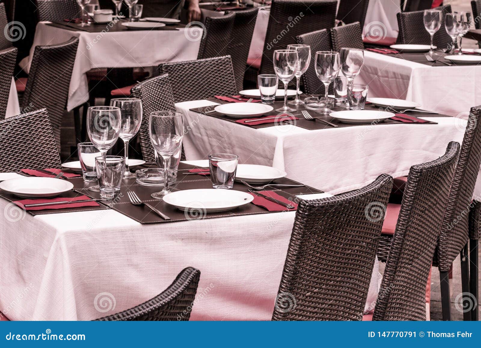 Tableware in a restaurant stock image. Image of cutlery 147770791