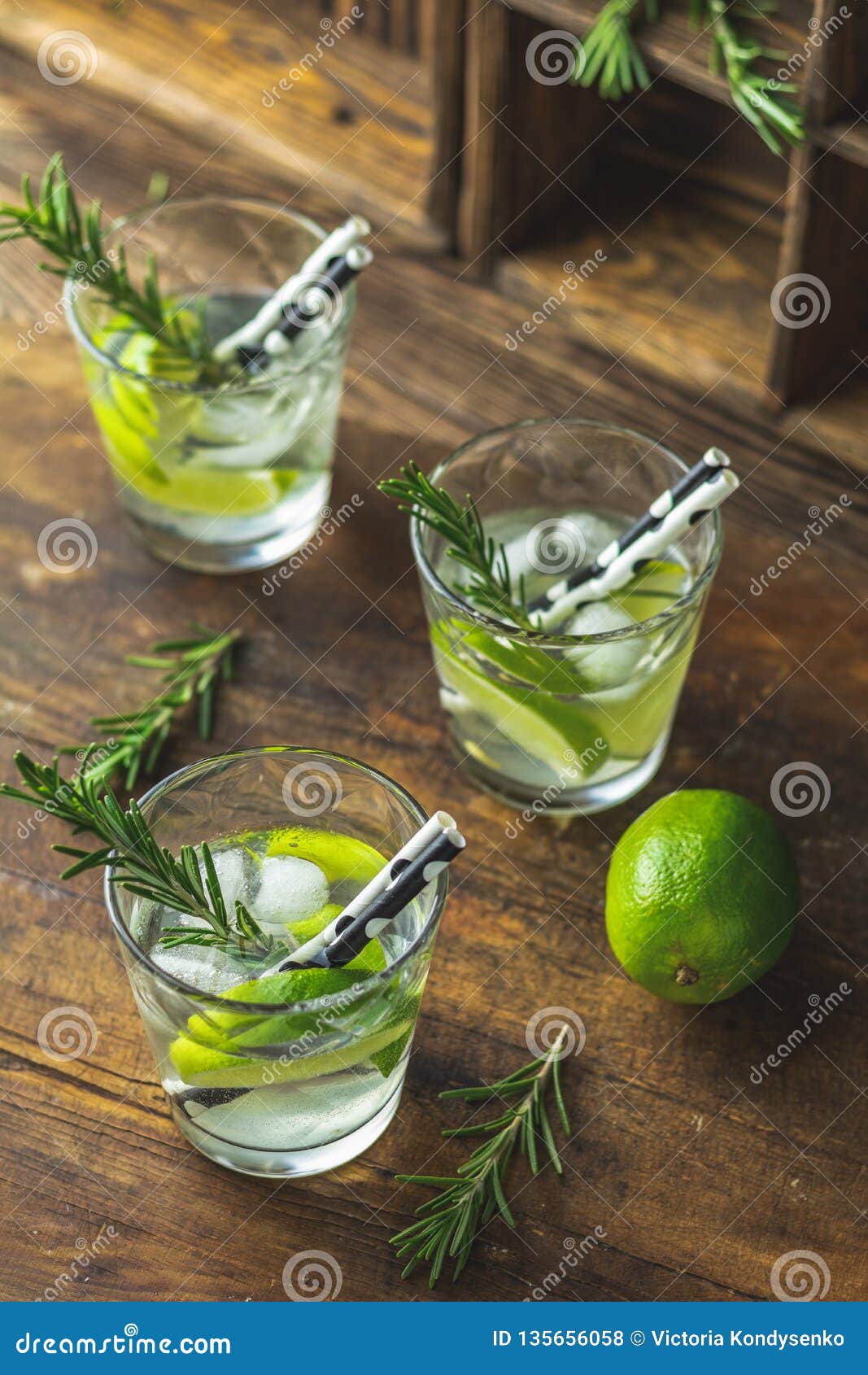 Fresh Cocktail with Lime, Ice and Rosemary, Mojito Cocktail Stock Photo