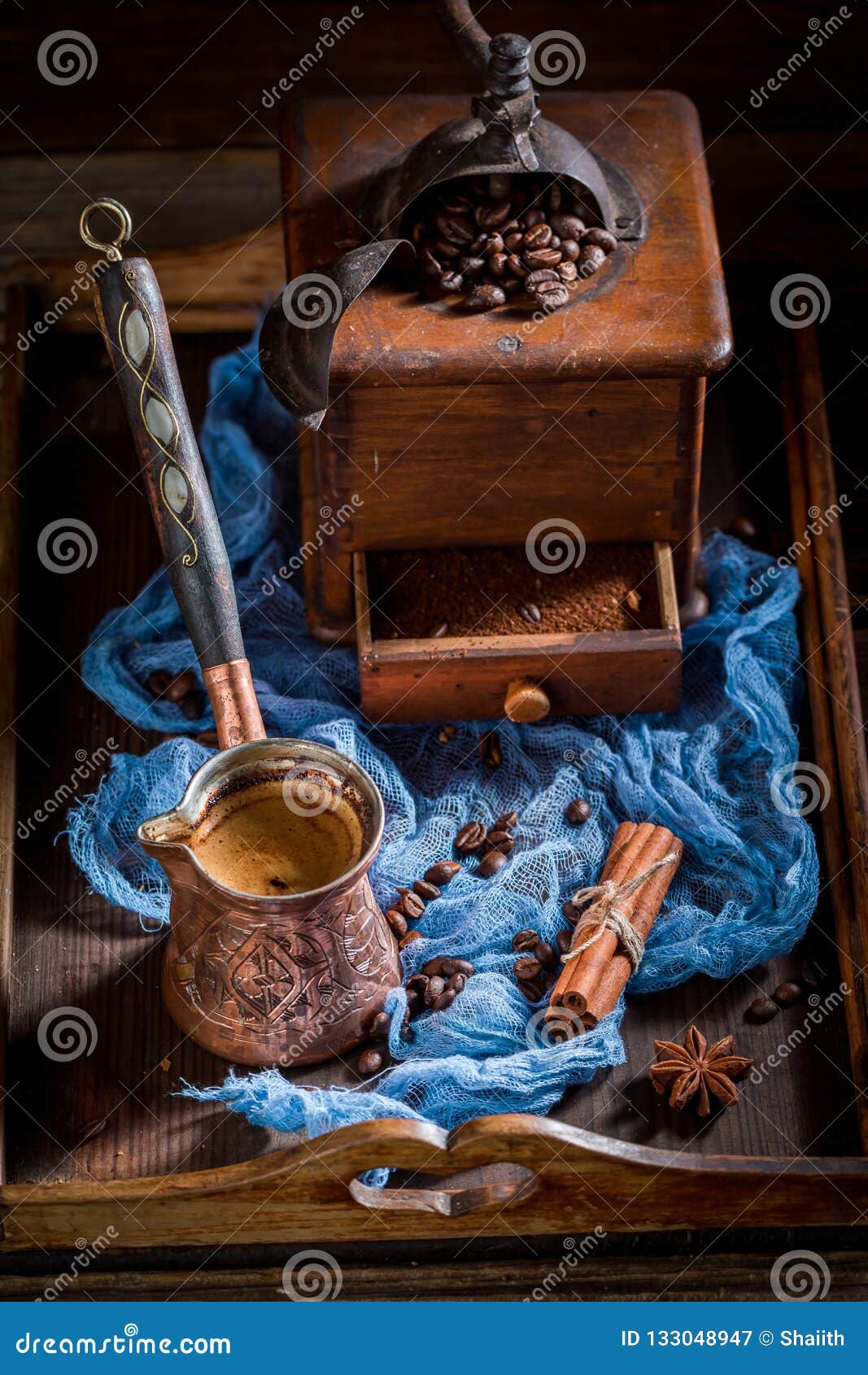Fresh Coffee with Pot Boiled Coffee and Beans on Blue Stock Image