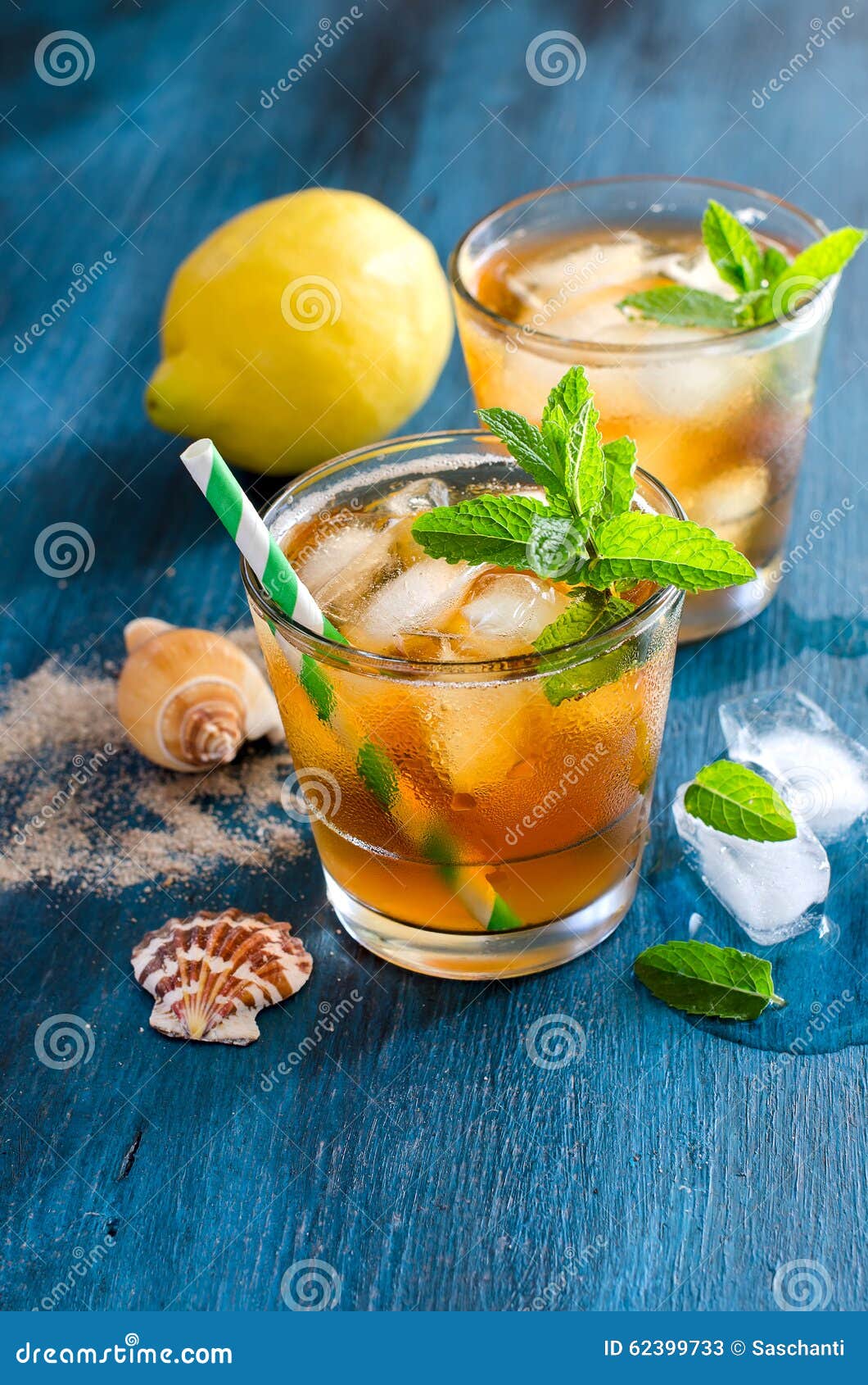 Fresh Cold Iced Tea with Mint, Ice and Lemons, Refreshing Drink Stock
