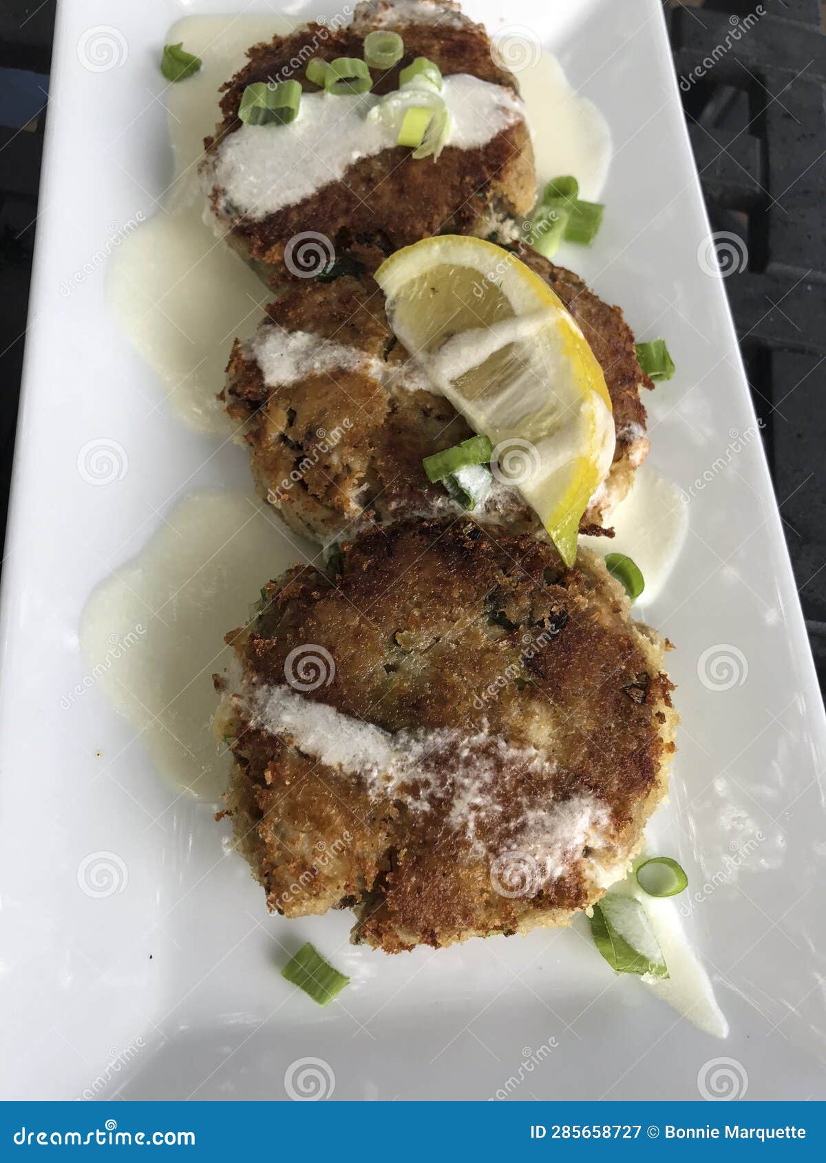 Fresh Cooked Crab Cakes at Restaurant. Stock Image Image of parsley